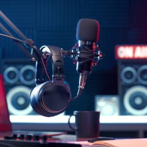 Professional microphone and headphones at the radio station, entertainment and communication concept